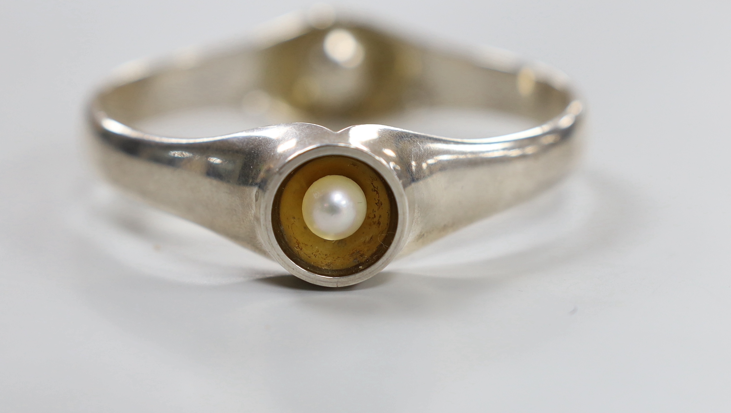 A Nanna Ditzel? for Georg Jensen sterling and two stone cultured pearl set bangle, design no. 277.